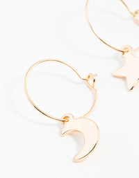 Gold Star & Moon Huggie Earrings - link has visual effect only