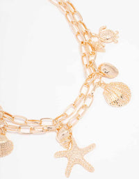 Gold Starfish & Turtle Layered Necklace - link has visual effect only