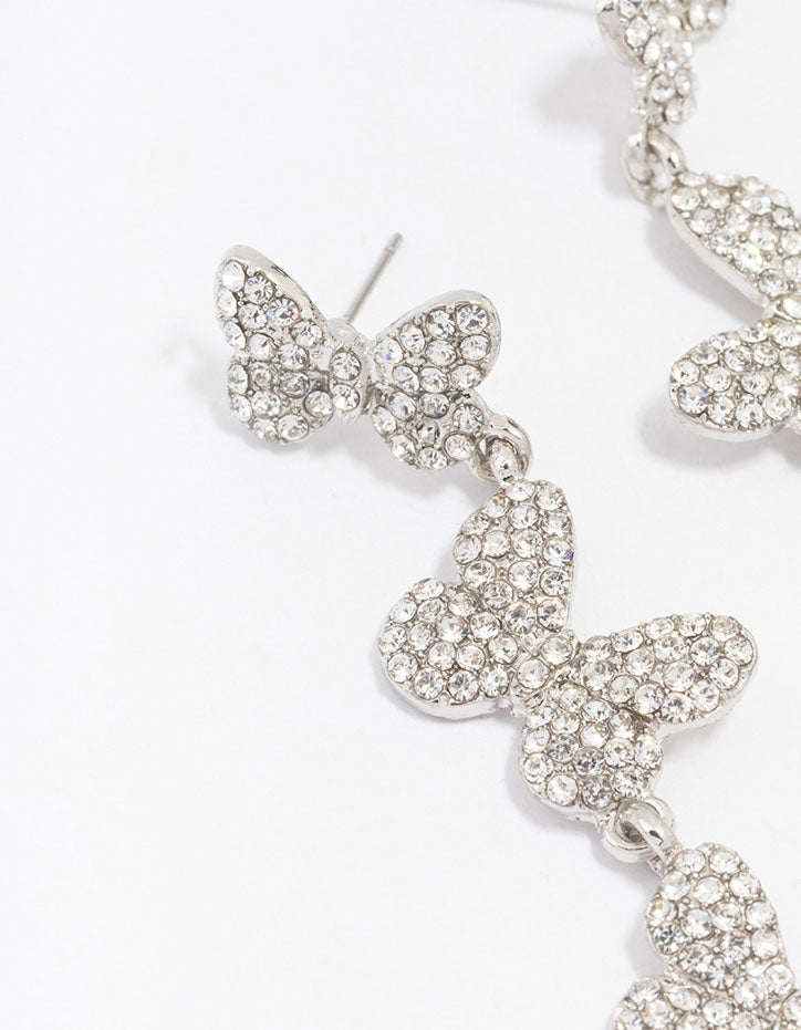 Rhodium Triple Butterfly Diamante Drop Earrings